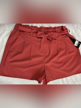 90Degree by Reflex high-waist paper-bag tie shorts, pockets in rust-orange
